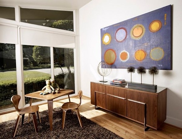 Art consultant reviewing works for a client collection